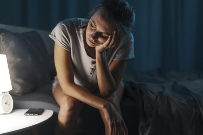 Exhausted woman suffering from insomnia