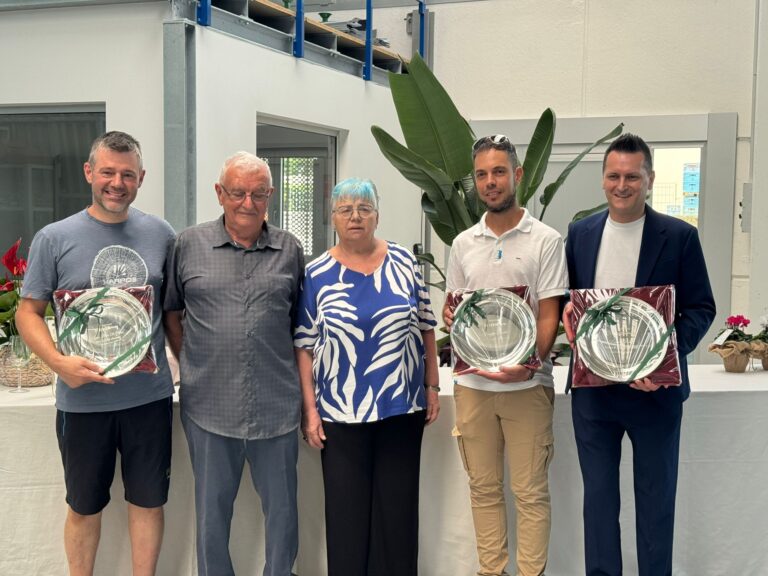 Tiziano e Fanny con i tre dipendenti storici